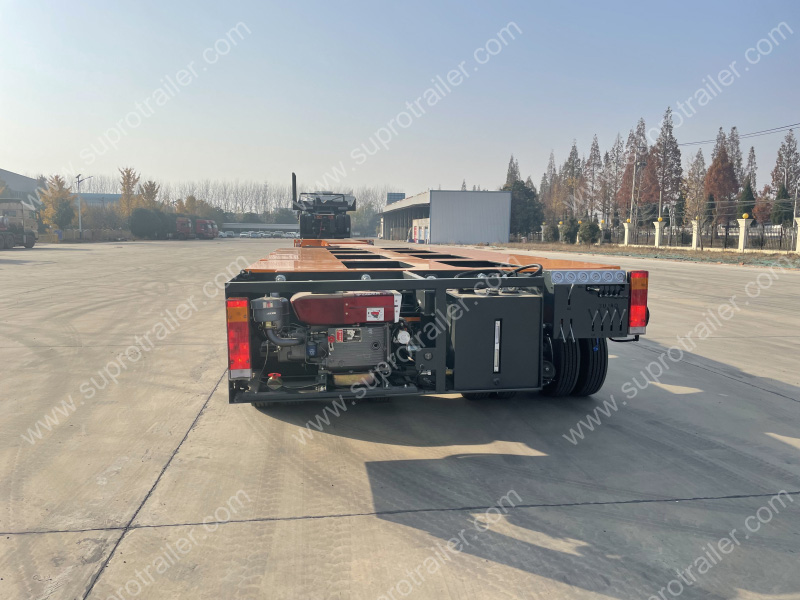 extendable spacer with hydraulic modular trailer