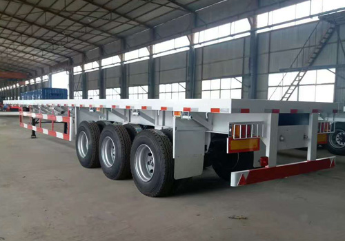Remolque de contenedor de 40 pies con 3 ejes y plataforma plana.