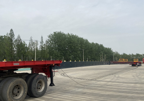 Remorque extensible à poutre de 5 essieux, 70 tonnes et 40 mètres