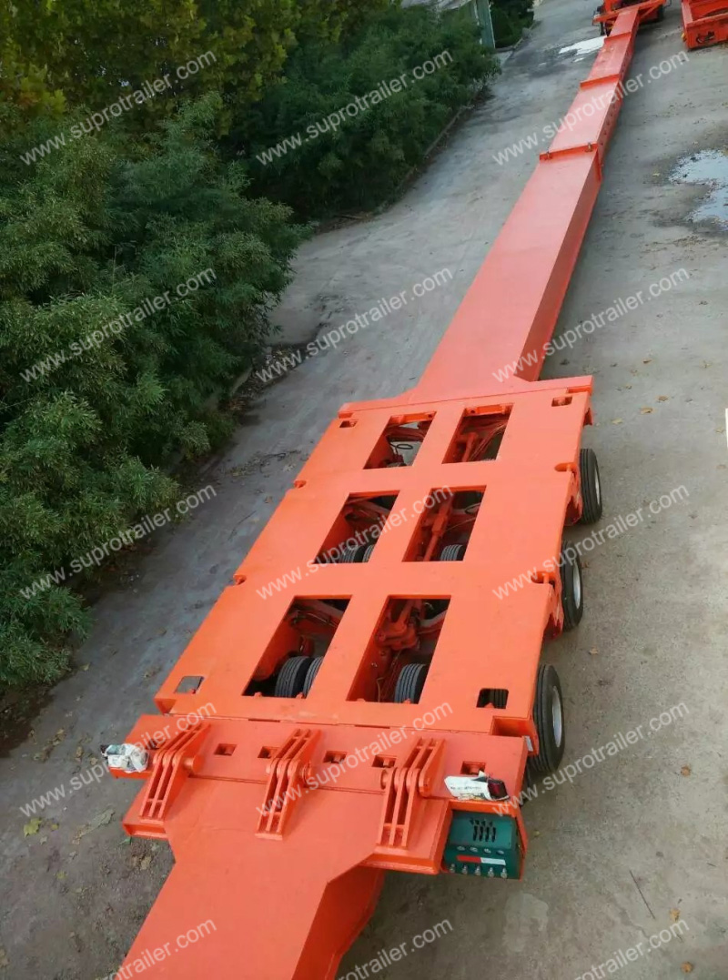 telescoping beam with hydraulic modular trailer