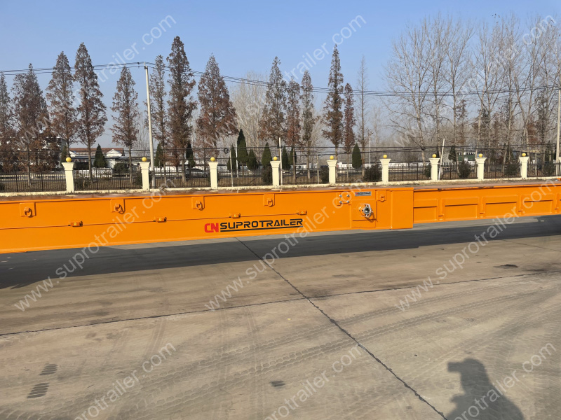 extendable spacer with hydraulic modular trailer