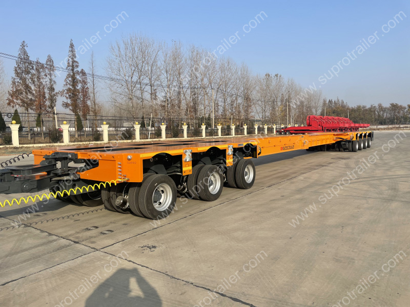 extendable spacer with hydraulic modular trailer