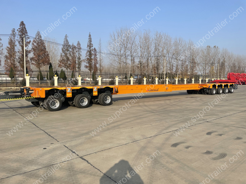 extendable spacer with hydraulic modular trailer